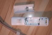 Manette Nintendo Wii blanche (originale) + bracelet