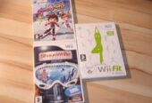 Wii balance board + Wii Fit et 2 jeux