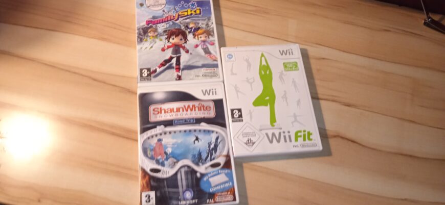 Wii balance board + Wii Fit et 2 jeux